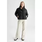 Su Geçirmez Relax Fit Kapitone Kumaşlı Şişme Mont from  at M4D # 0124587444